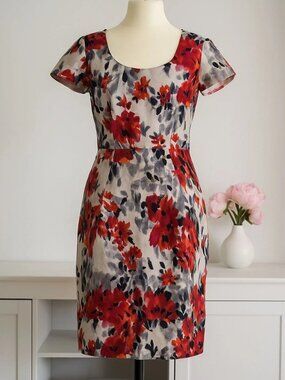 The linen-colored Amabola fabric blend dress designed by Finn Wright Manson